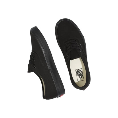 Black Vans shoes on a white background