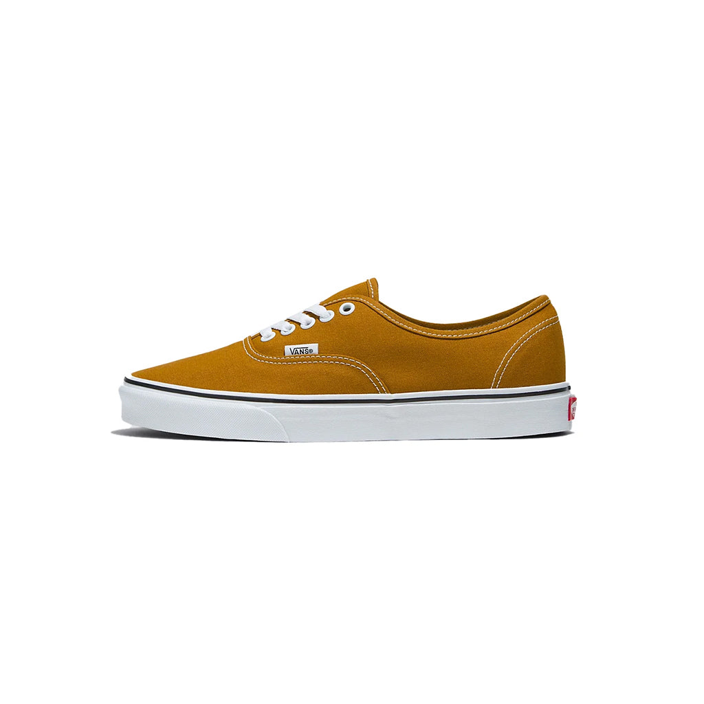 Brown sneaker with white sole on a white background