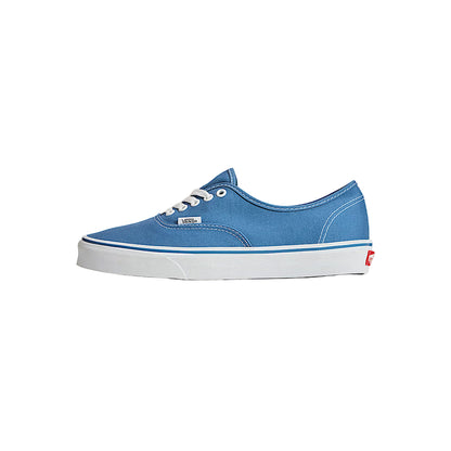 Blue sneaker with white sole on a light gray background