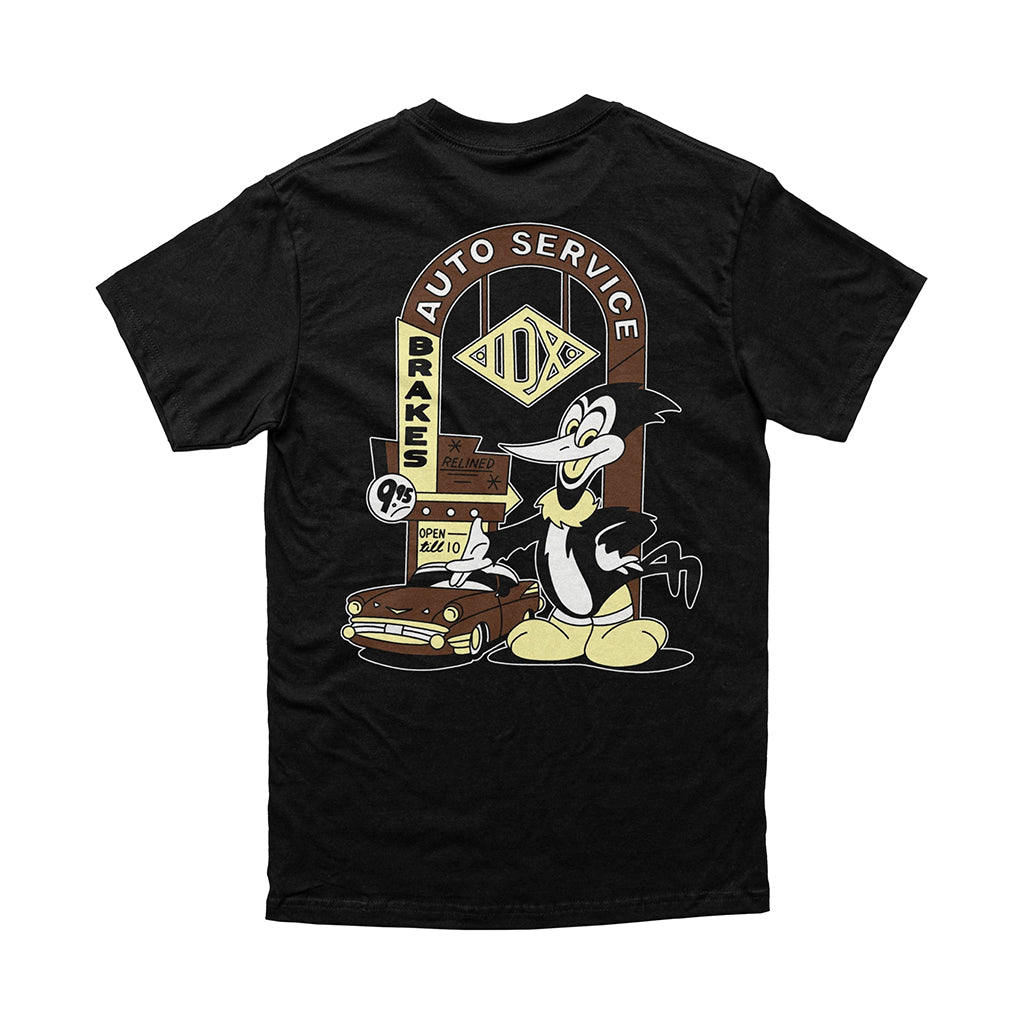 Black t-shirt with cartoon character and auto service graphic on a white background