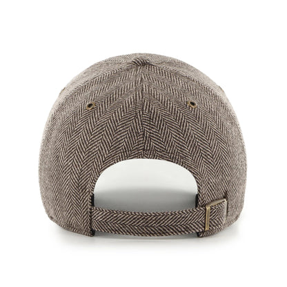 Brown patterned cap on a white background