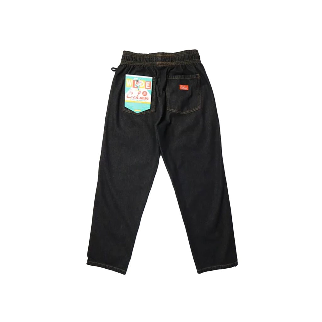Black pants with colorful labels on a white background