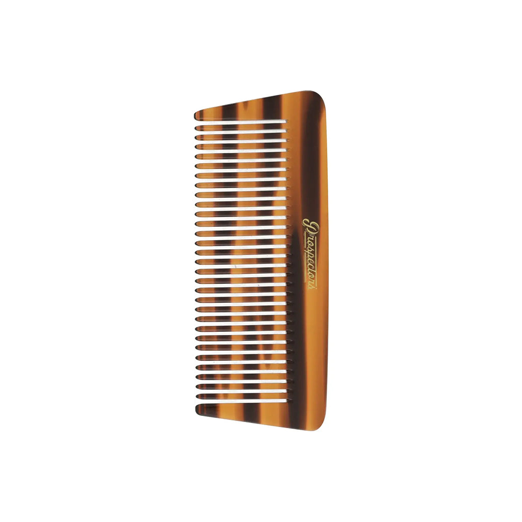 Tortoiseshell comb on a white background