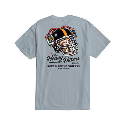 Light blue t-shirt with a graphic of a football helmet and text on the back, on a white background.
