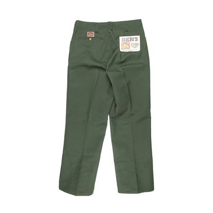 Green pants with a brand label on a white background