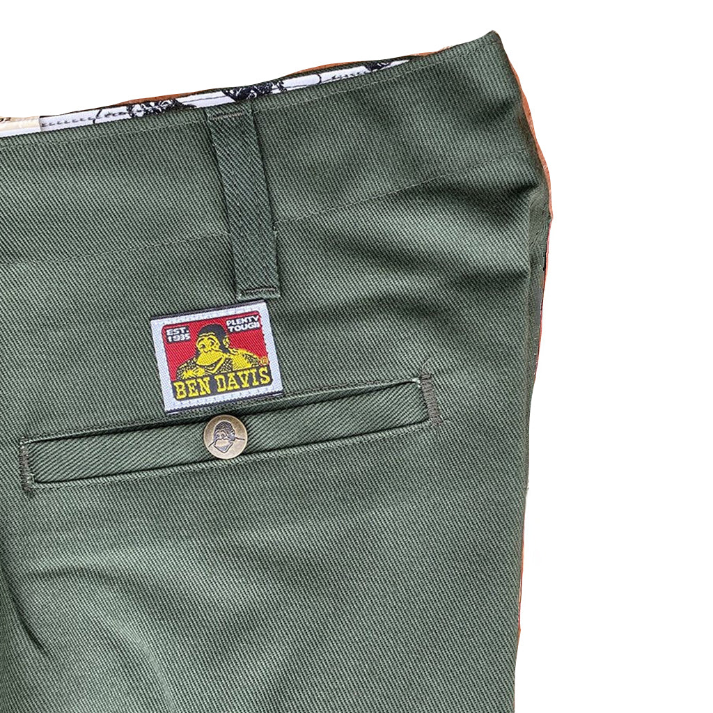 Green pants with a Ben Davis label on a white background