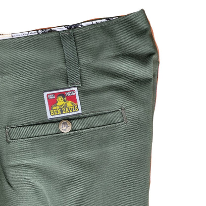 Green pants with a Ben Davis label on a white background