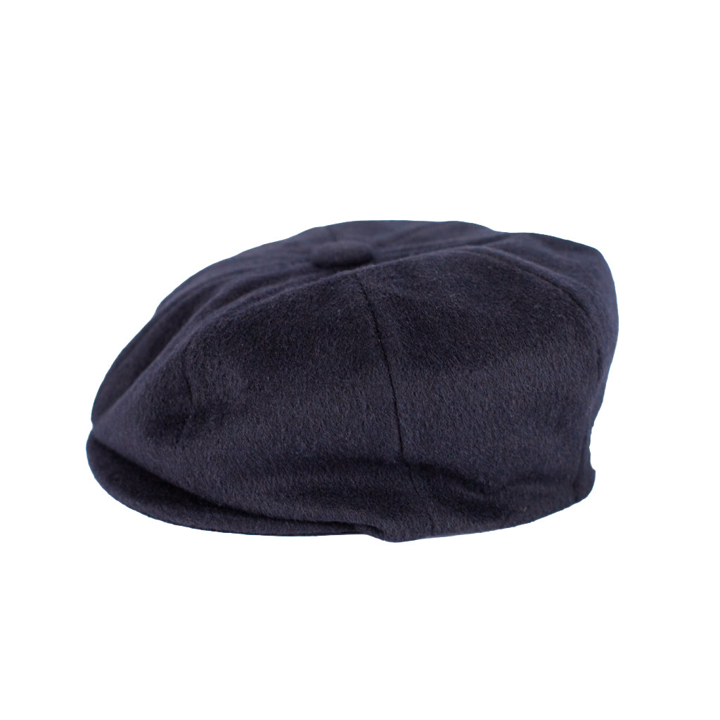 Navy blue beret on a white background
