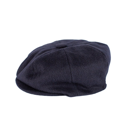 Navy blue beret on a white background