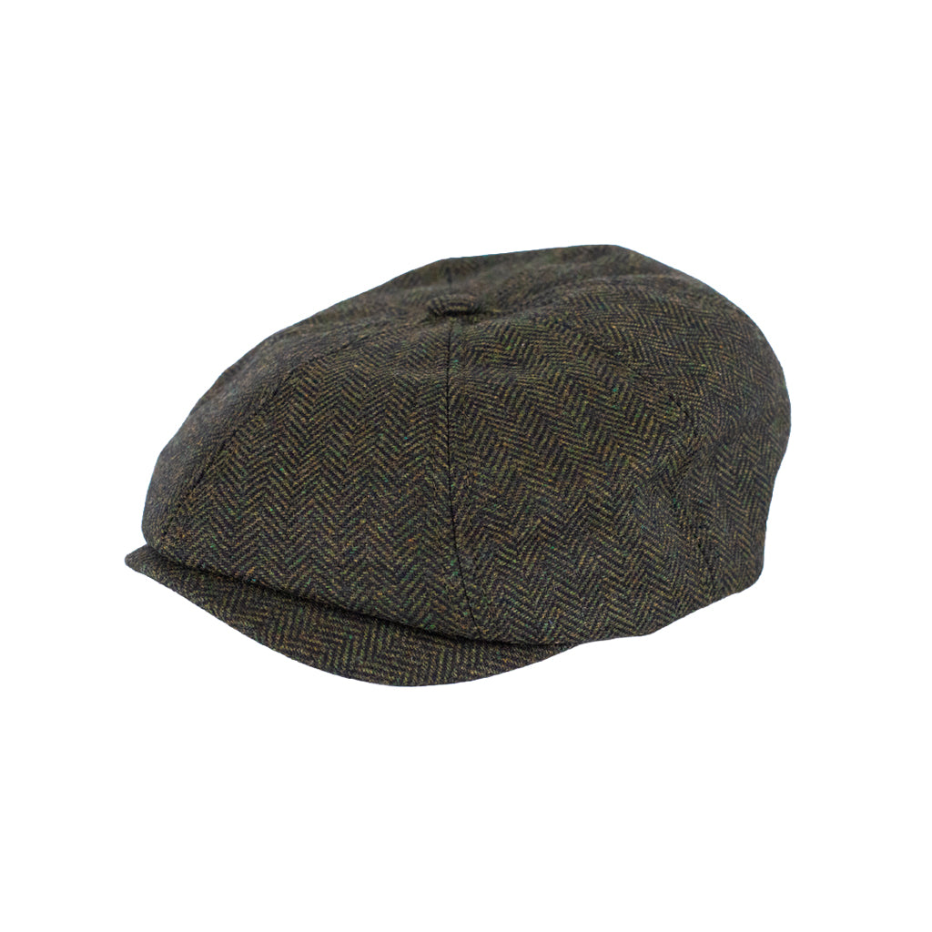 Herringbone patterned cap on a white background