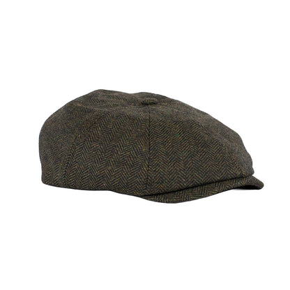 Herringbone patterned cap on a white background