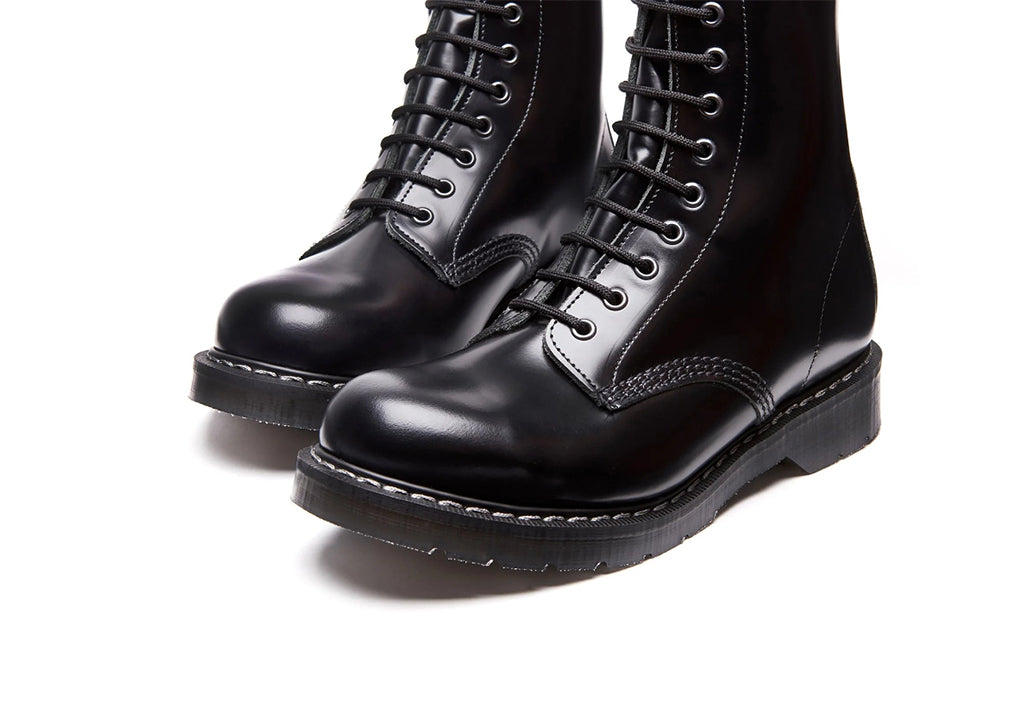 close up Black Hi-Shine 8 Eye Derby Boot on a white background