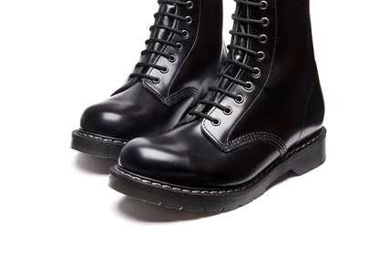 close up Black Hi-Shine 8 Eye Derby Boot on a white background