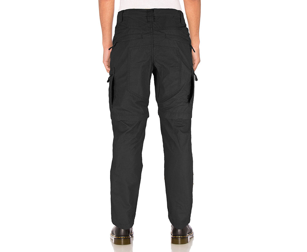 Black cargo pants worn by a person on a white background