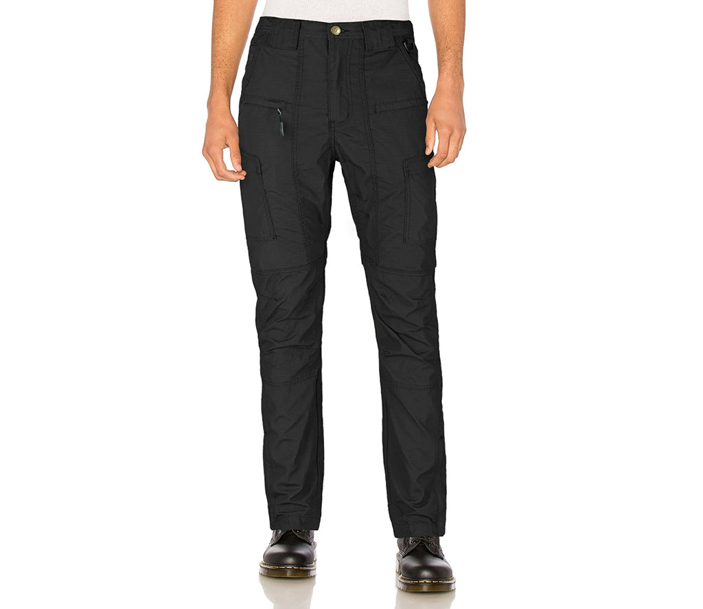 Black pants worn by a person on a white background