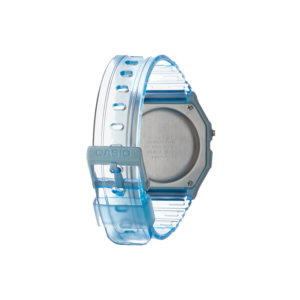 Casio watch with a clear blue strap on a white background