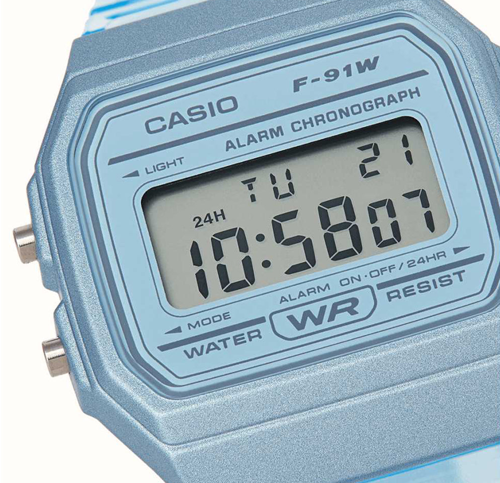 Casio digital watch with blue casing on a white background