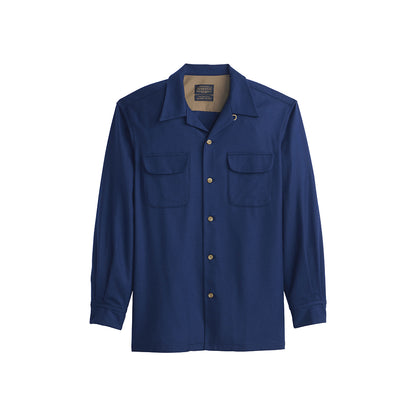 Blue shirt with button details on a white background