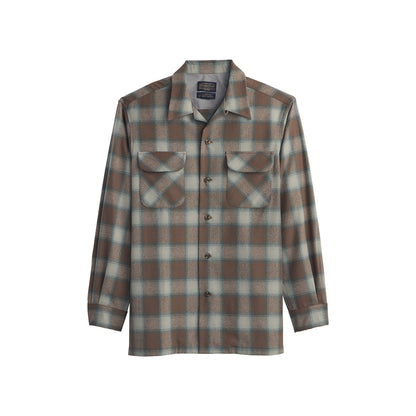 Plaid shirt with a visible brand label on a white background