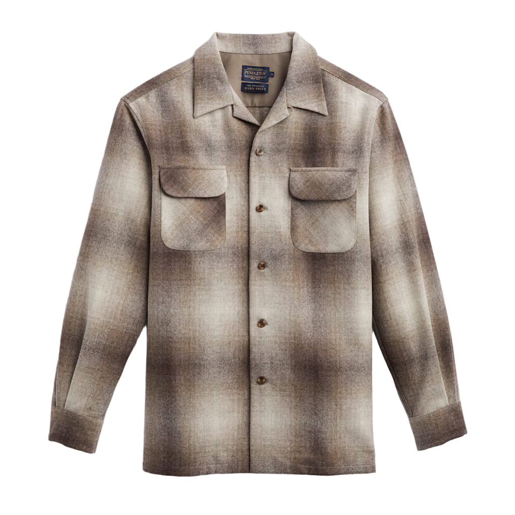 Plaid shirt with two front pockets on a light background