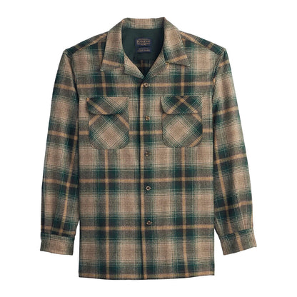 Plaid shirt with two front pockets on a white background