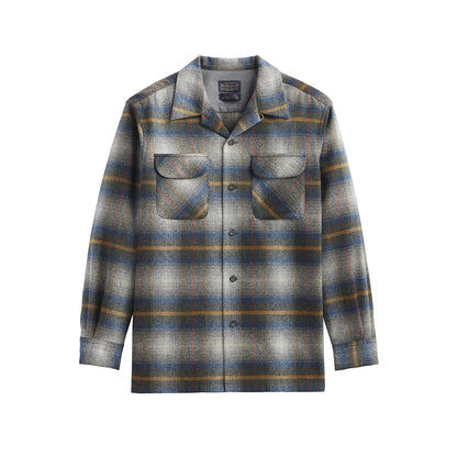 Plaid shirt with button details on a white background
