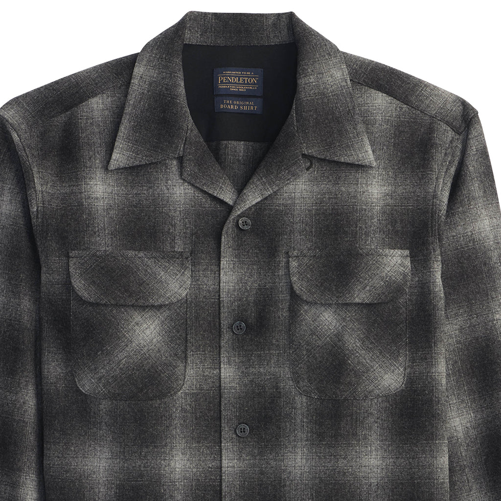 Gray plaid shirt with Pendleton label on a white background