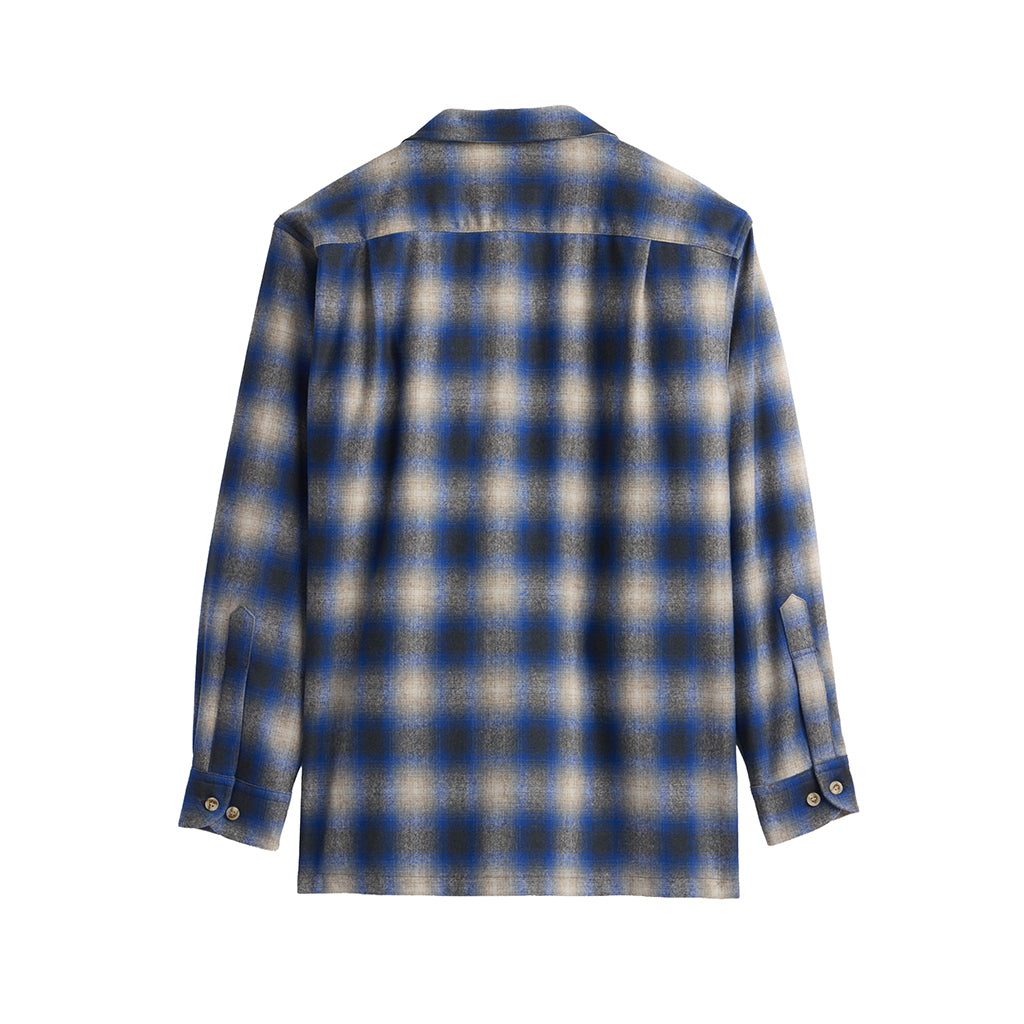 Blue and gray plaid shirt on a white background