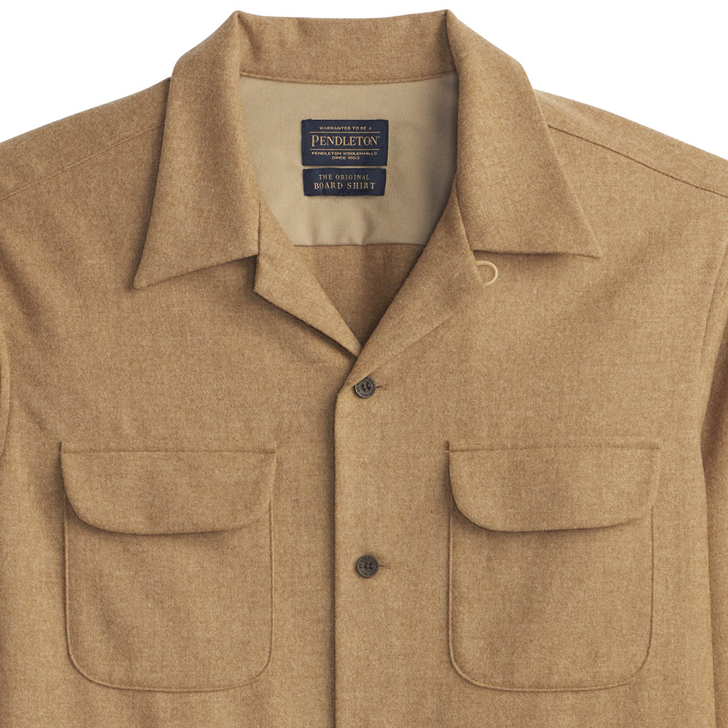 Brown shirt with two front pockets and a Pendleton label on a white background