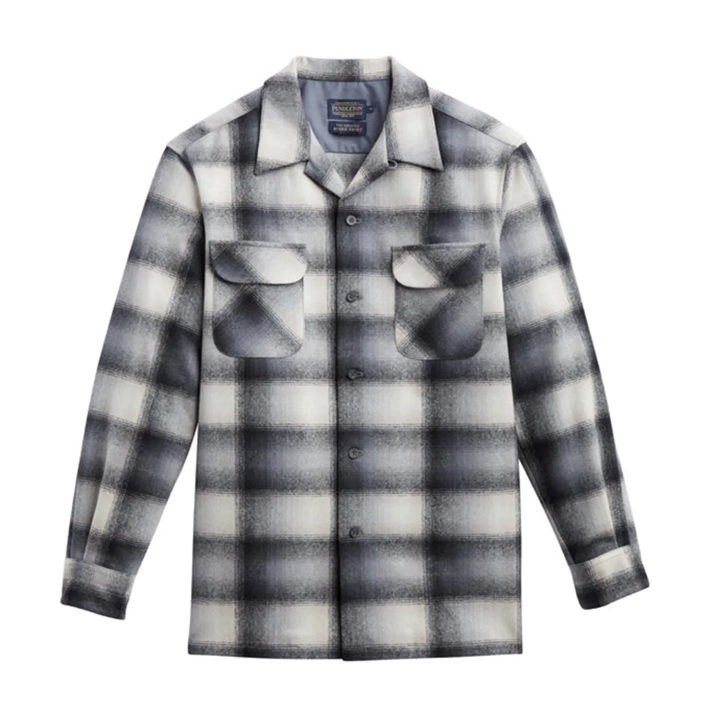 a long-sleeved, plaid board shirt with a tan and slate ombre design on a white background