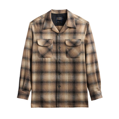 Plaid shirt with two front pockets on a white background