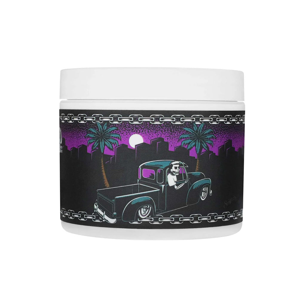 Jar with a graphic design of a truck and palm trees on a black band with purple gradient