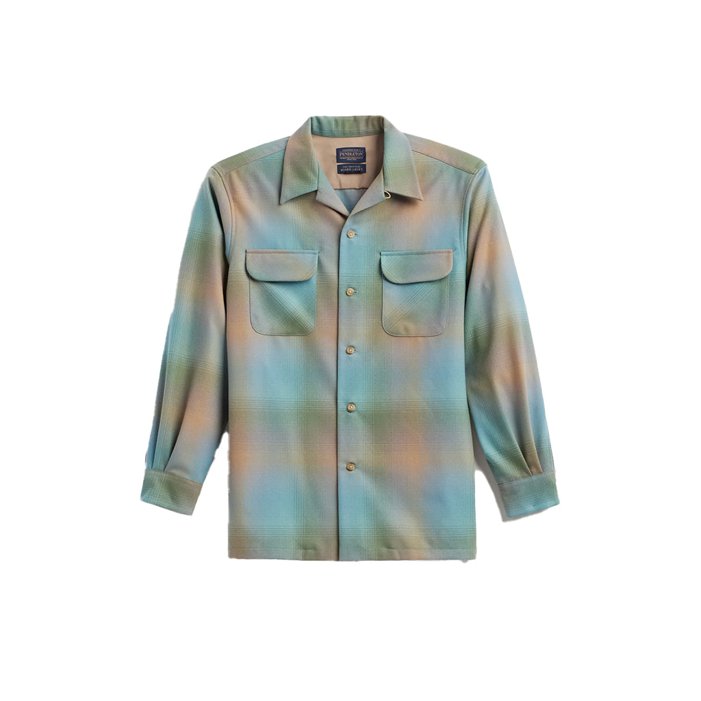 Blue/Green shirt with a brand label on a white background