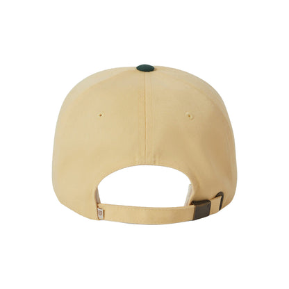 Beige baseball cap with a leather strap on a white background