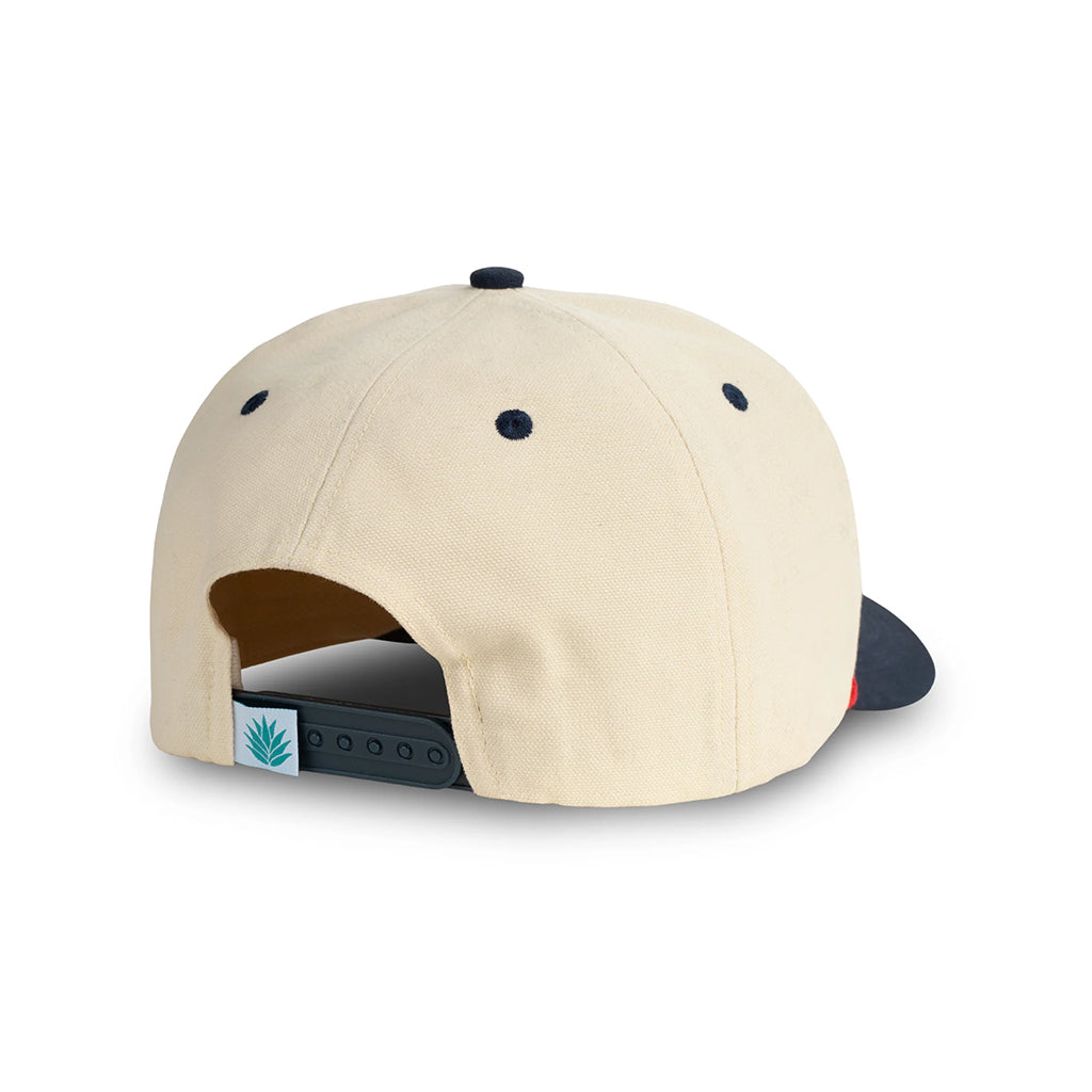 Beige cap with black brim and logo on a white background