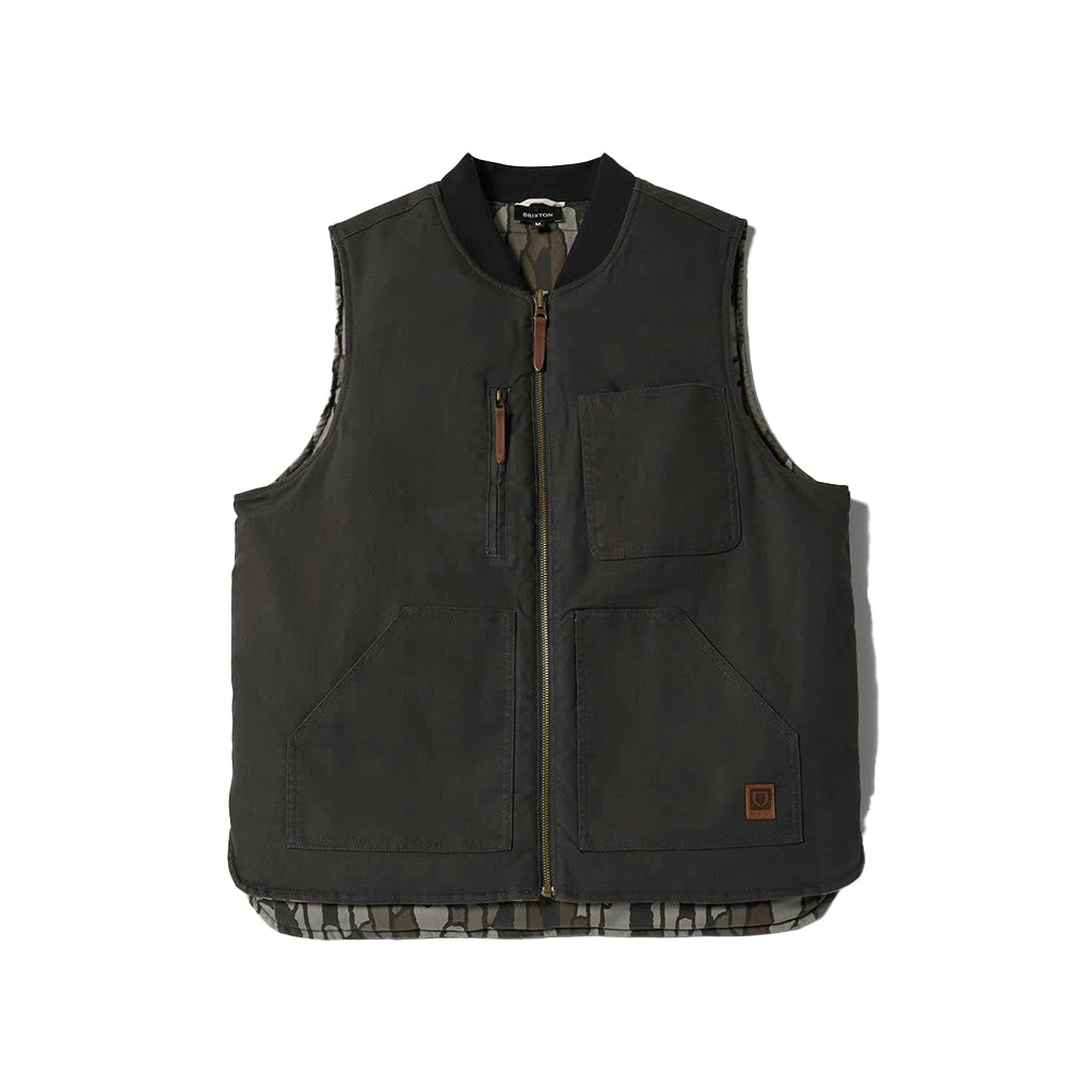 Black vest with zippers and buttons on a white background