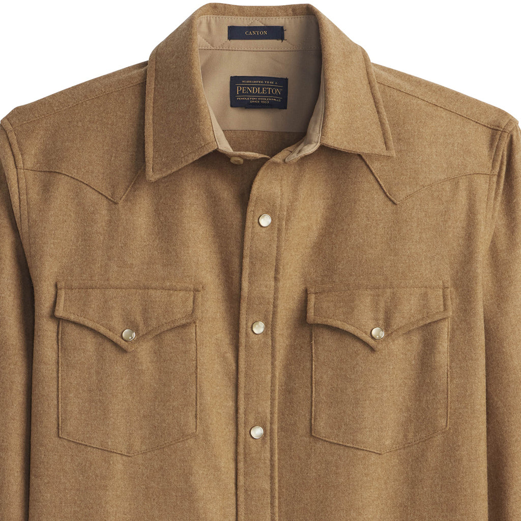 Brown shirt with button details on a white background