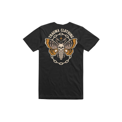 Black t-shirt with a skull and chain design on the back, branded 'Trauma Clothing', on a white background.