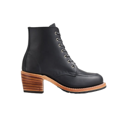 Black leather boot with a wooden block heel on a white background