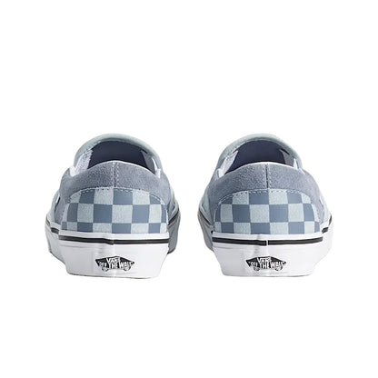 Pair of Vans shoes with checkered pattern on a white background