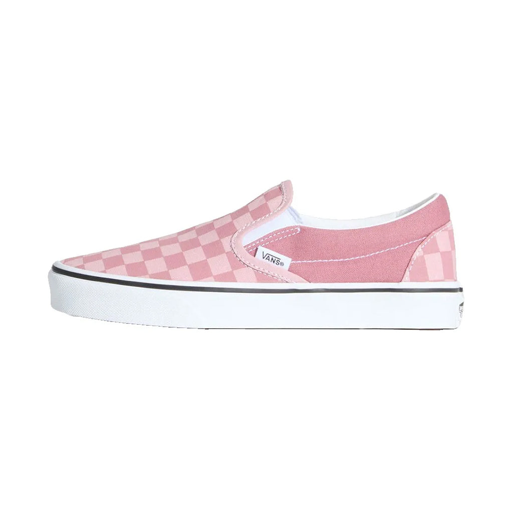 Pink checkered slip-on shoe with white sole on a white background