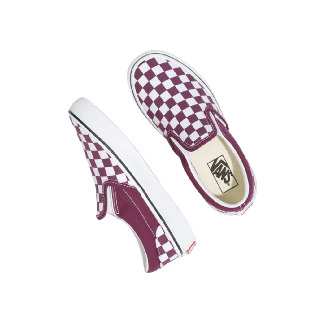 Pair of Vans sneakers with checkered design on a white background