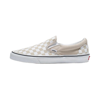Blue slip-on sneaker with white sole on a white background