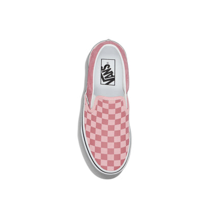 Pink checkered slip-on Vans shoe on a white background