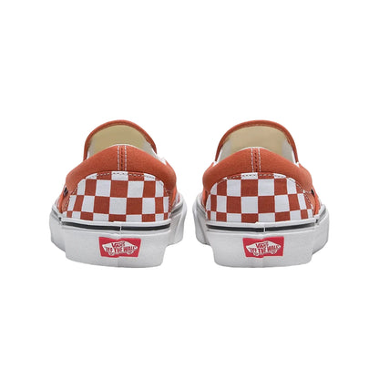 Pair of Vans slip-on shoes with checkered pattern and red logo on a white background