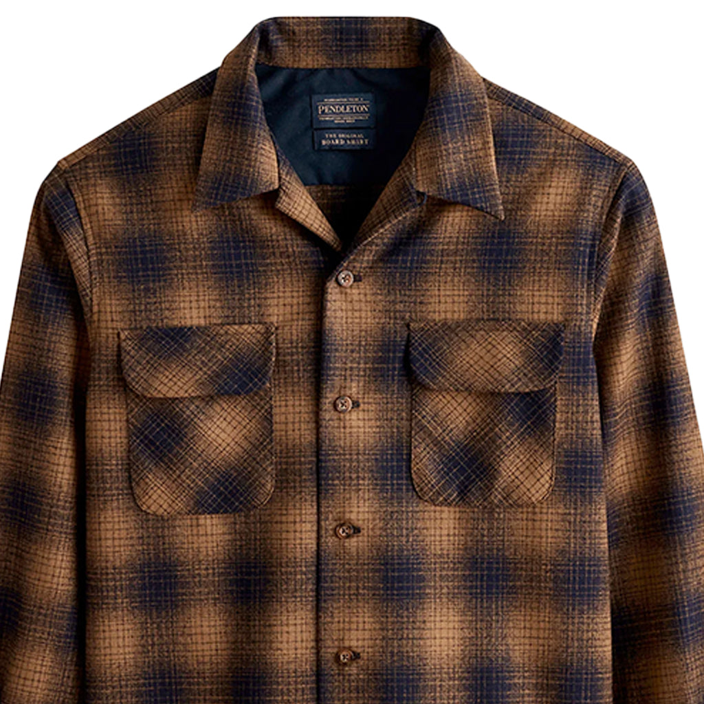 Plaid shirt with two front pockets on a white background