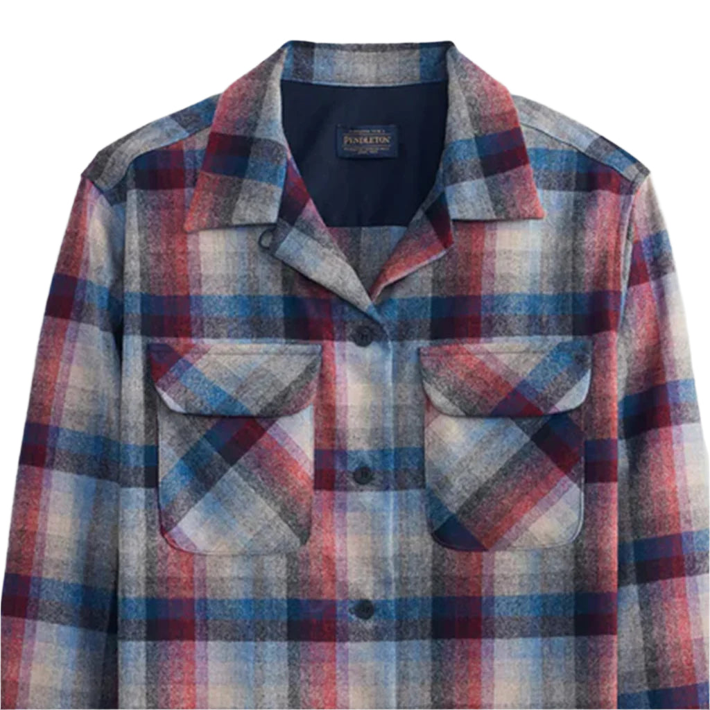 Plaid shirt with two front pockets on a white background