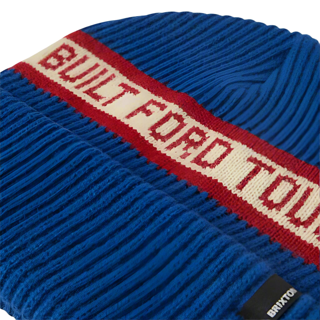 Blue knit beanie with 'Built Ford Tough' text on a white background