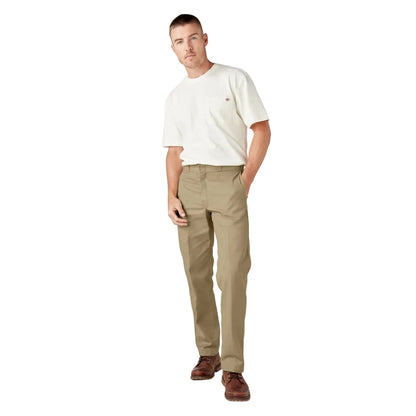 Man wearing a white t-shirt and beige pants on a white background