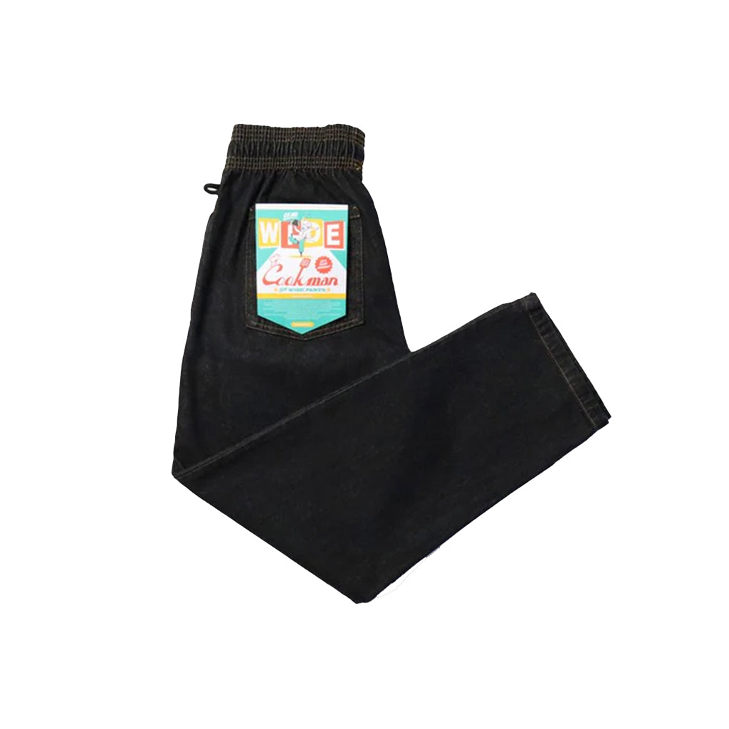 Black pants with a colorful label on a white background
